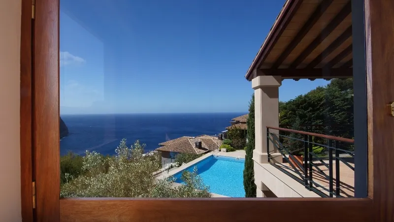 Villa in Cala Llamp - Living room view over the garden and pool