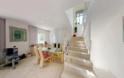 Townhouse in Calvià Village - Stairs and dining with fireplace