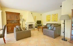 Villa in El Toro - Port Adriano - Living area with fireplace