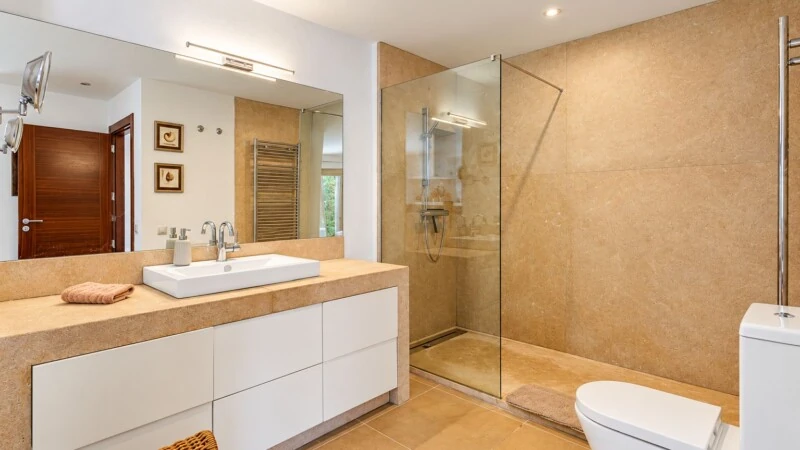 Villa in El Toro - Port Adriano - Modern Beige Spa Bathroom.jpg