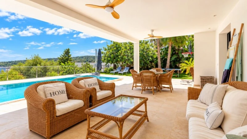 Villa in El Toro - Port Adriano - Sunlit Mediterranean Patio Overlooking Pool.jpg